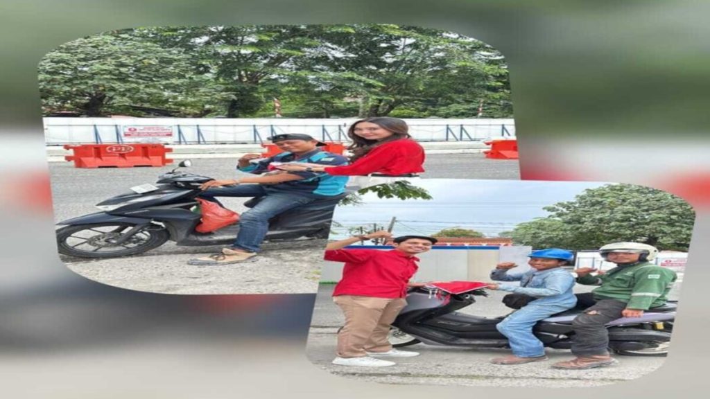 BRI Branch Office Medan Gatot Subroto Bagikan Bendera Merah Putih Kepada Masyarakat di HUT ke-81 Republik Indonesia